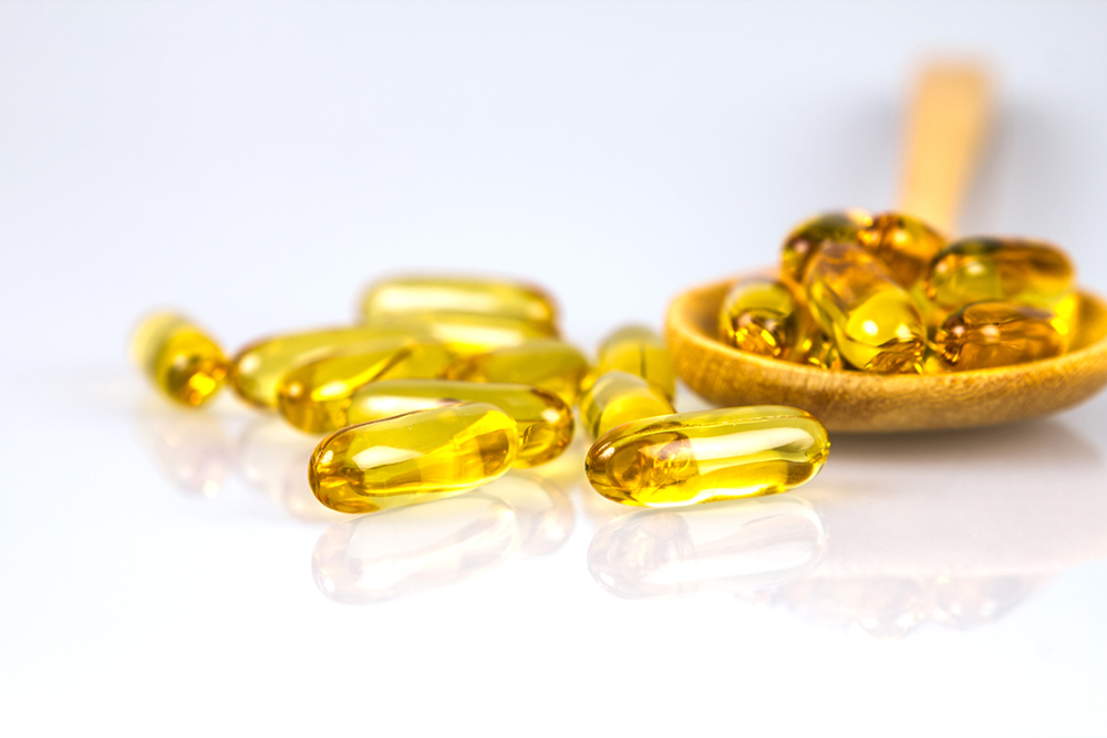 Close-up-of-yellow-gelatin-fish-oil-capsules-467224954_5184x3456