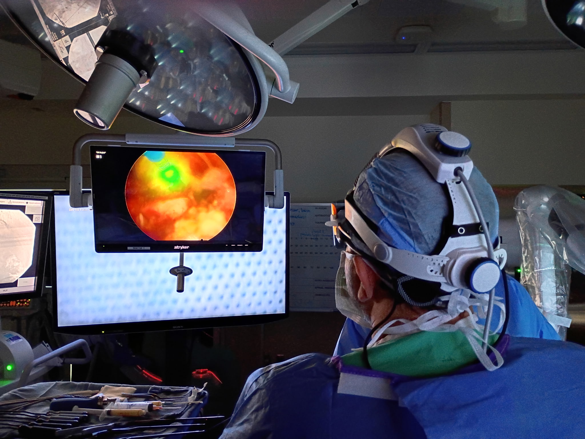 Dr. Ahmadian performing laser spine surgery